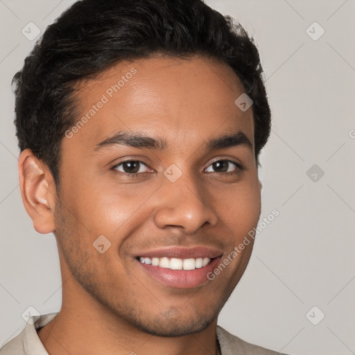 Joyful latino young-adult male with short  brown hair and brown eyes