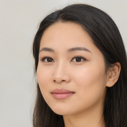 Neutral asian young-adult female with long  black hair and brown eyes