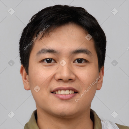 Joyful asian young-adult male with short  brown hair and brown eyes