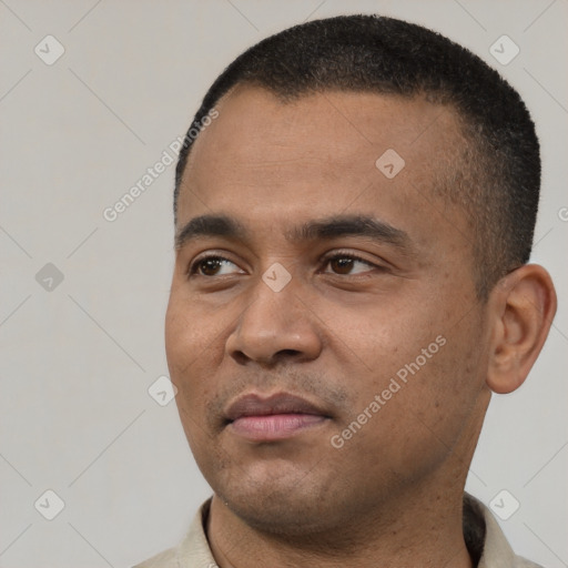 Neutral latino young-adult male with short  black hair and brown eyes