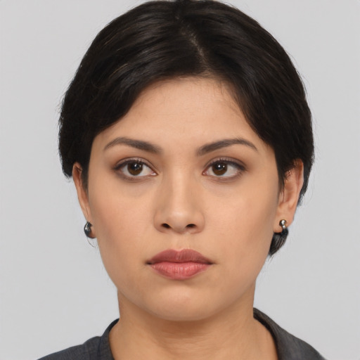 Neutral asian young-adult female with medium  black hair and brown eyes