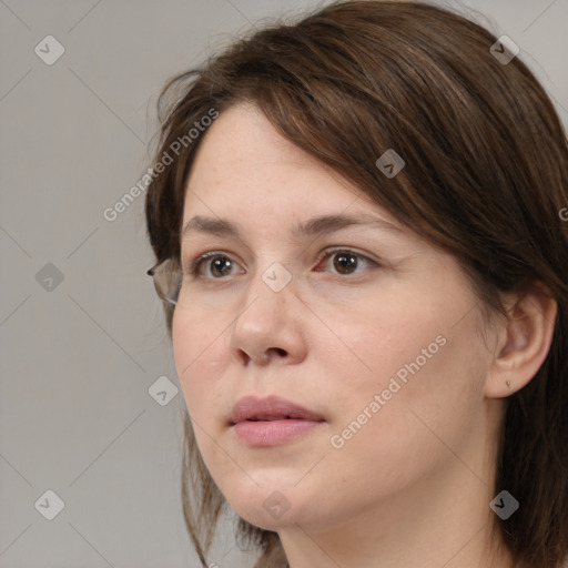 Neutral white adult female with medium  brown hair and brown eyes