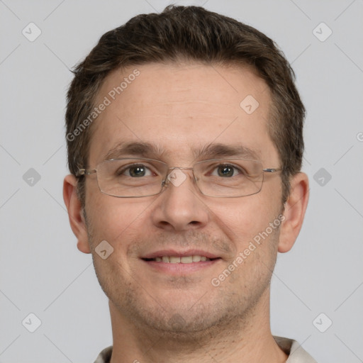 Joyful white adult male with short  brown hair and grey eyes