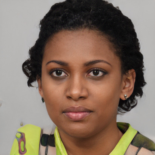 Neutral black young-adult female with short  black hair and brown eyes