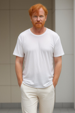 Middle-aged male with  ginger hair