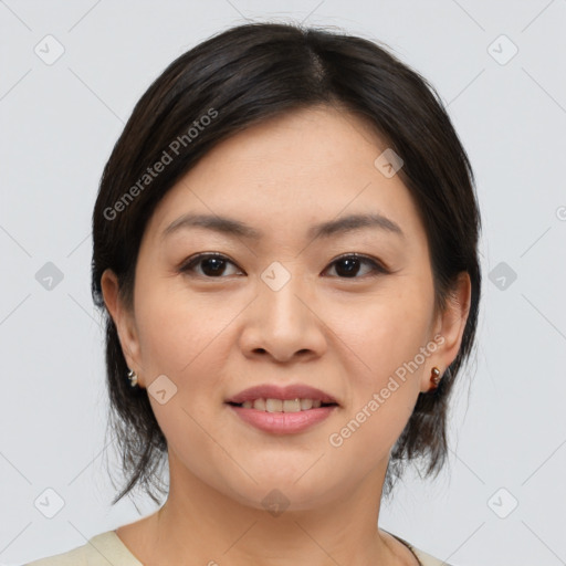 Joyful asian young-adult female with medium  brown hair and brown eyes