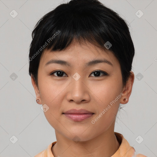 Joyful asian young-adult female with short  brown hair and brown eyes