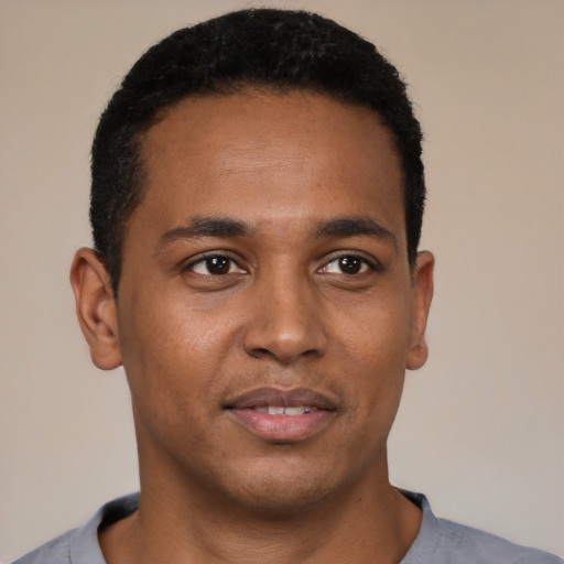 Neutral black young-adult male with short  black hair and brown eyes