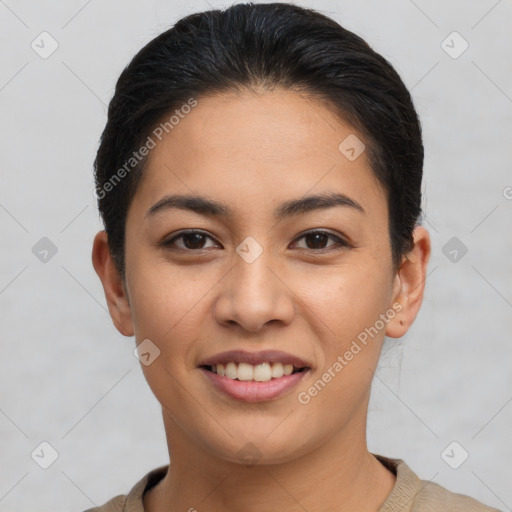 Joyful latino young-adult female with short  brown hair and brown eyes