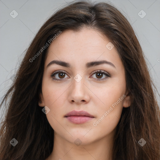 Neutral white young-adult female with long  brown hair and brown eyes