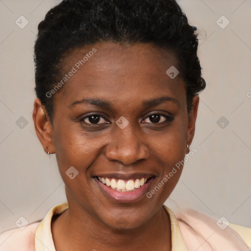 Joyful black young-adult female with short  brown hair and brown eyes