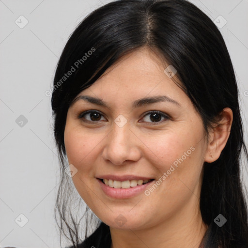 Joyful white young-adult female with long  brown hair and brown eyes