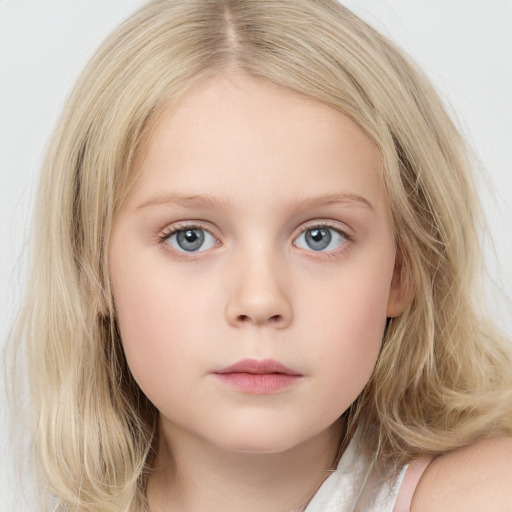 Neutral white child female with long  brown hair and blue eyes