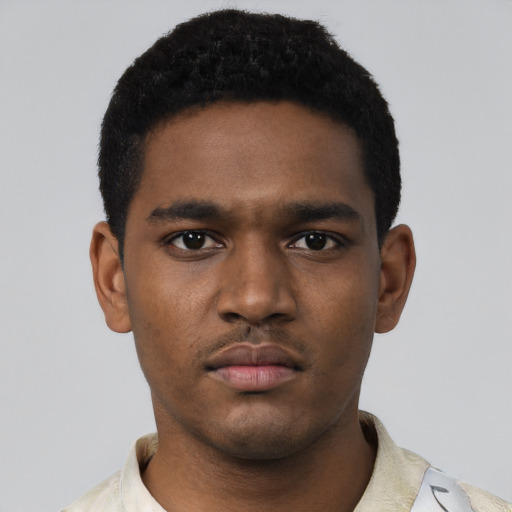 Neutral black young-adult male with short  black hair and brown eyes