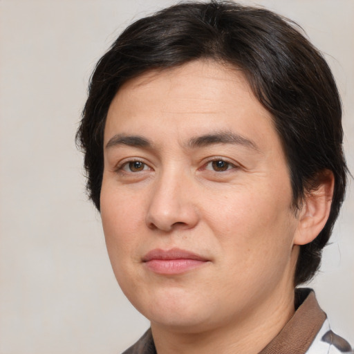 Joyful white young-adult male with medium  brown hair and brown eyes