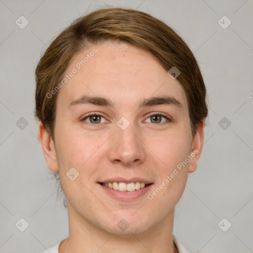 Joyful white young-adult female with short  brown hair and grey eyes