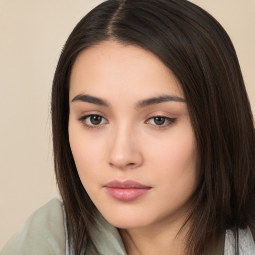 Neutral white young-adult female with long  brown hair and brown eyes