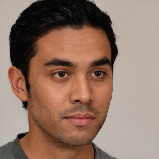 Neutral white young-adult male with short  black hair and brown eyes