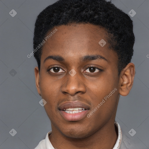 Joyful black young-adult male with short  black hair and brown eyes