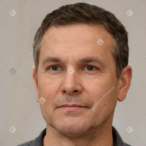 Neutral white adult male with short  brown hair and brown eyes