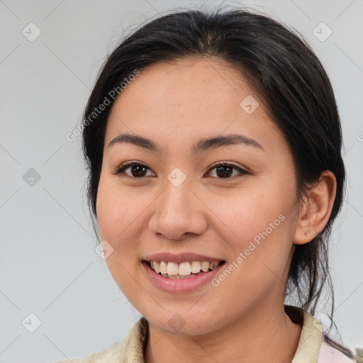 Joyful white young-adult female with medium  brown hair and brown eyes