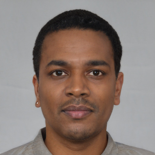 Neutral black young-adult male with short  black hair and brown eyes