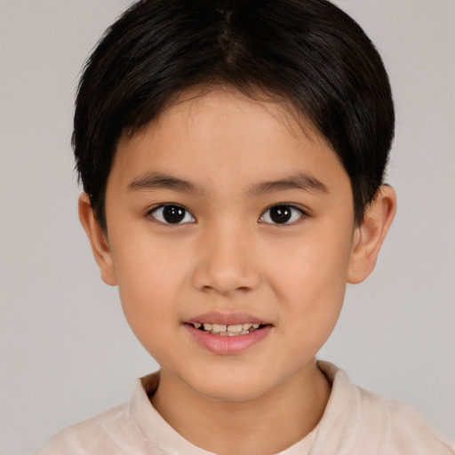 Joyful white child female with short  brown hair and brown eyes