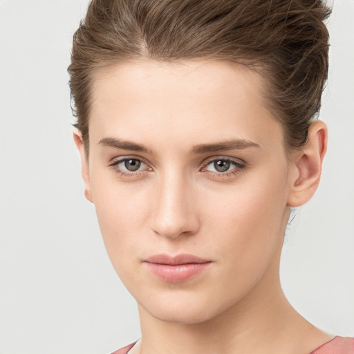 Neutral white young-adult female with short  brown hair and brown eyes