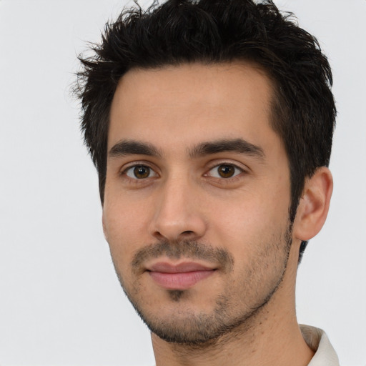 Neutral white young-adult male with short  black hair and brown eyes
