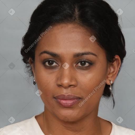 Joyful black young-adult female with medium  brown hair and brown eyes