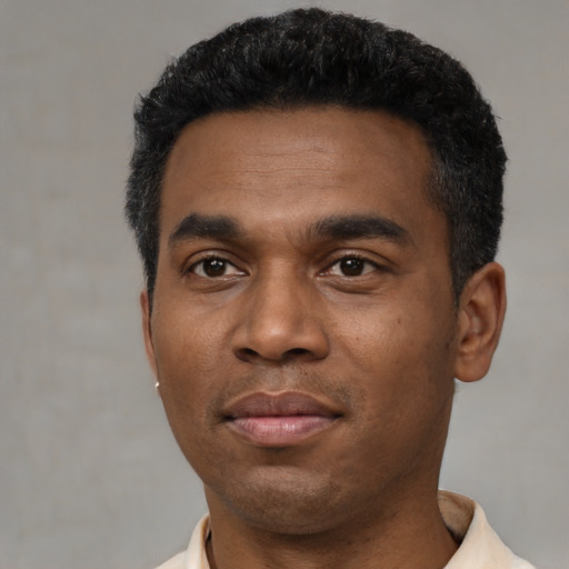 Neutral black young-adult male with short  black hair and brown eyes