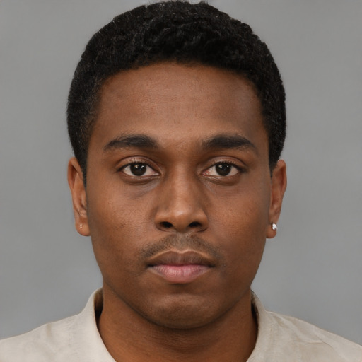 Neutral black young-adult male with short  brown hair and brown eyes