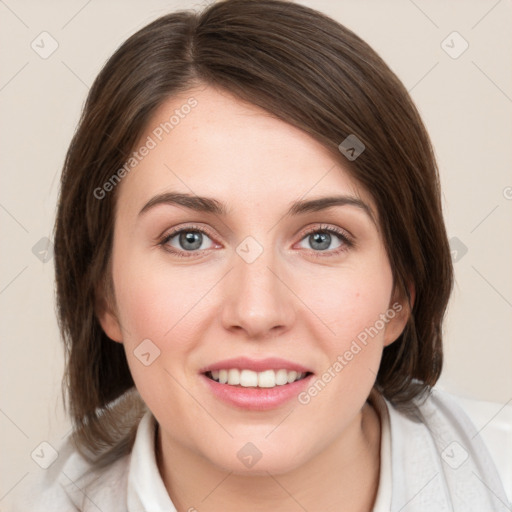 Joyful white young-adult female with medium  brown hair and green eyes