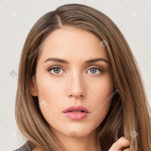 Neutral white young-adult female with long  brown hair and brown eyes