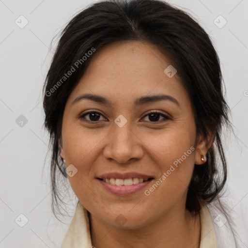 Joyful white adult female with medium  brown hair and brown eyes