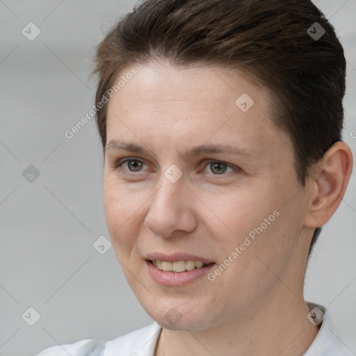 Joyful white adult female with short  brown hair and brown eyes