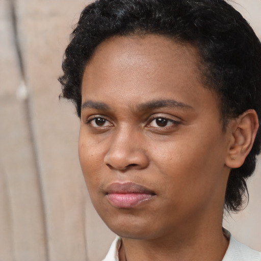 Neutral latino young-adult female with short  black hair and brown eyes