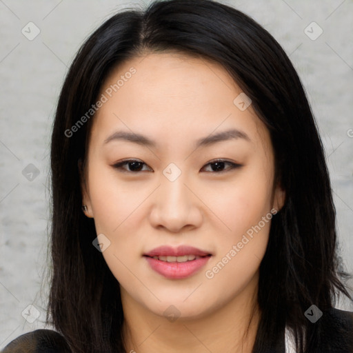 Joyful asian young-adult female with long  brown hair and brown eyes