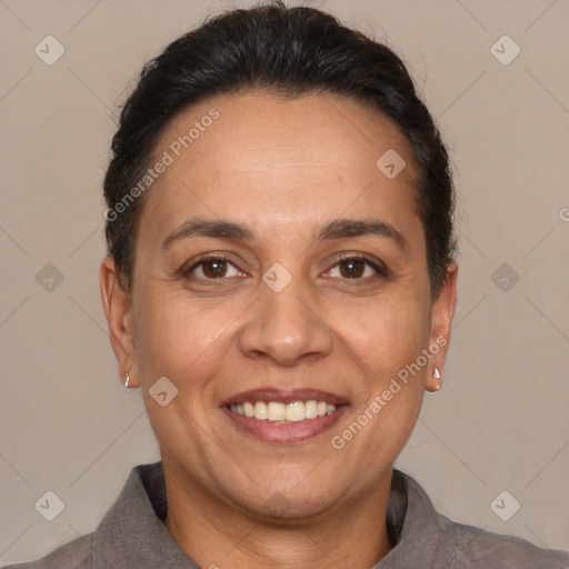 Joyful white adult female with short  brown hair and brown eyes