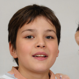 Joyful white child female with medium  brown hair and brown eyes