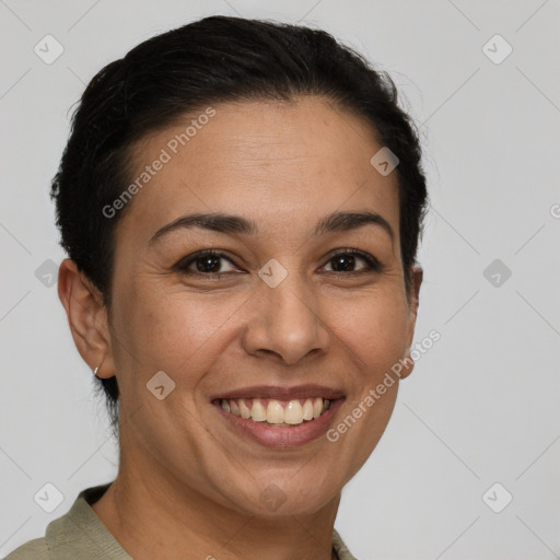 Joyful white adult female with short  brown hair and brown eyes