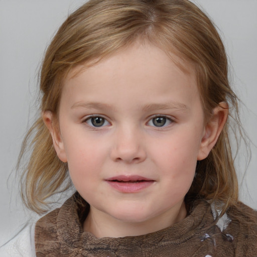 Joyful white child female with medium  brown hair and grey eyes