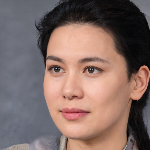 Joyful white young-adult female with medium  brown hair and brown eyes