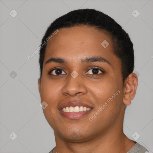 Joyful latino young-adult female with short  black hair and brown eyes