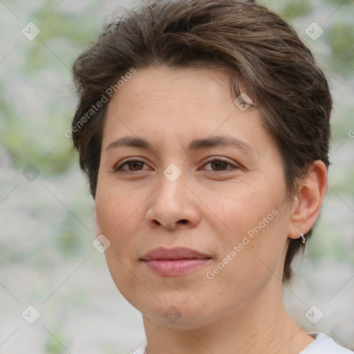 Joyful white adult female with medium  brown hair and brown eyes