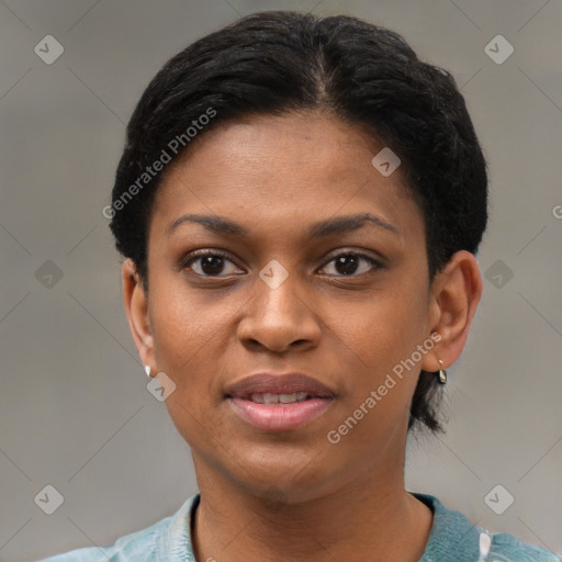 Joyful black young-adult female with short  black hair and brown eyes