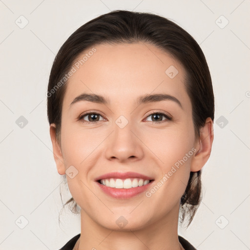 Joyful white young-adult female with medium  brown hair and brown eyes