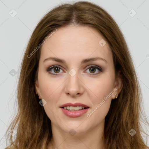 Joyful white young-adult female with long  brown hair and green eyes