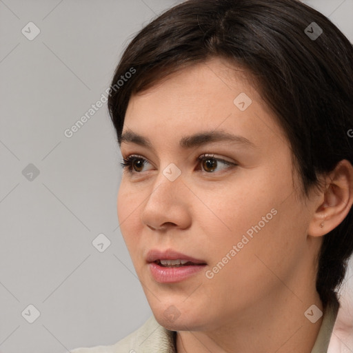 Joyful white young-adult female with medium  brown hair and brown eyes