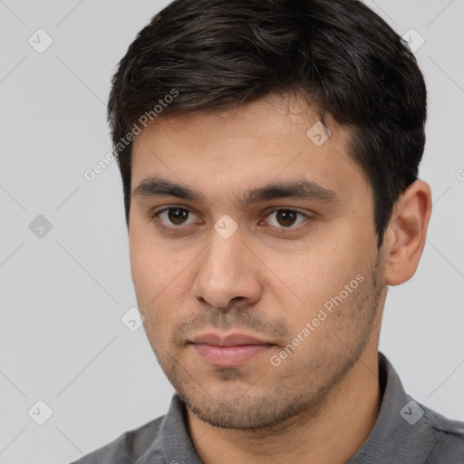 Neutral white young-adult male with short  brown hair and brown eyes